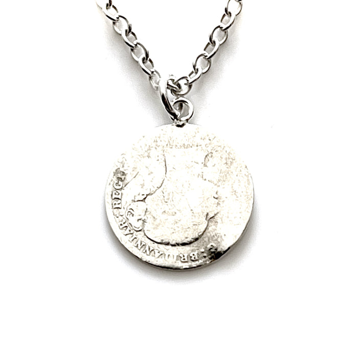Close-up of 1882 Victorian British Three Pence Coin in Silver Pendant