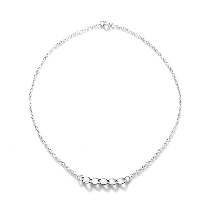 Detailed image capturing the reflective finish of Roberts & Co's sterling silver necklace