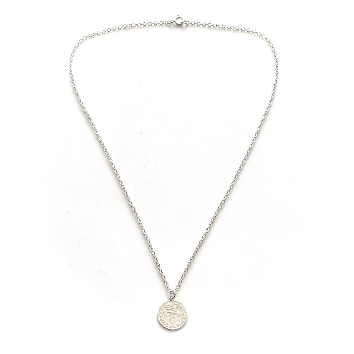 Vintage-inspired sterling silver pendant featuring a 1875 three pence coin