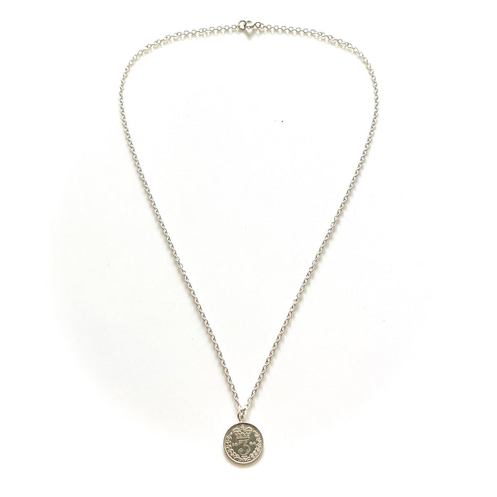 Elegant sterling silver necklace featuring a historic 1884 British three pence coin