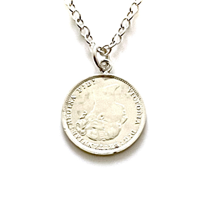 Authentic 1884 British coin necklace in sterling silver, exuding timeless charm
