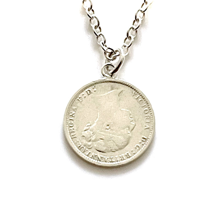 Authentic 1885 British coin necklace in sterling silver, radiating timeless elegance