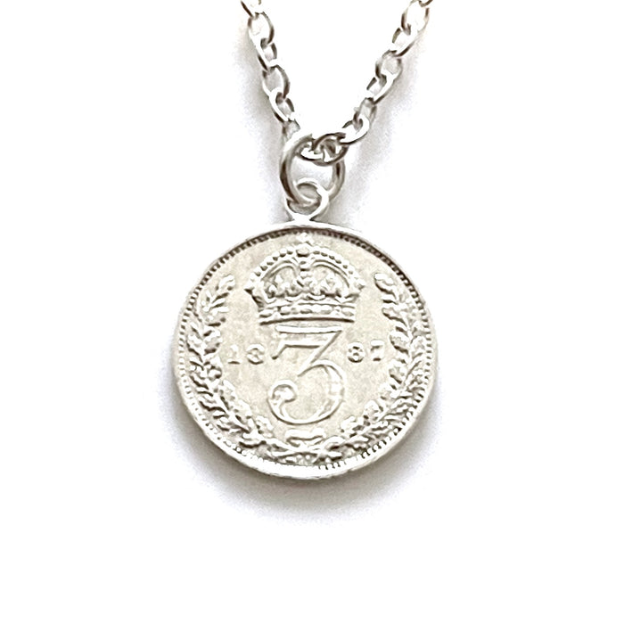 Genuine 1887 Victorian three pence coin pendant paired with a refined sterling silver chain