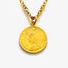 Close-up of 1888 three pence coin details in gold plated sterling silver pendant