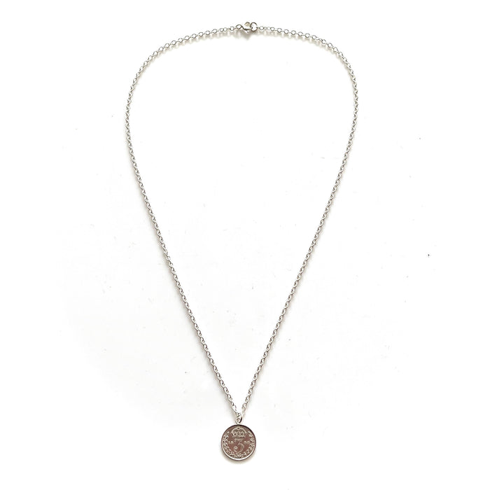 Timeless sterling silver necklace featuring an authentic 1893 British three pence coin