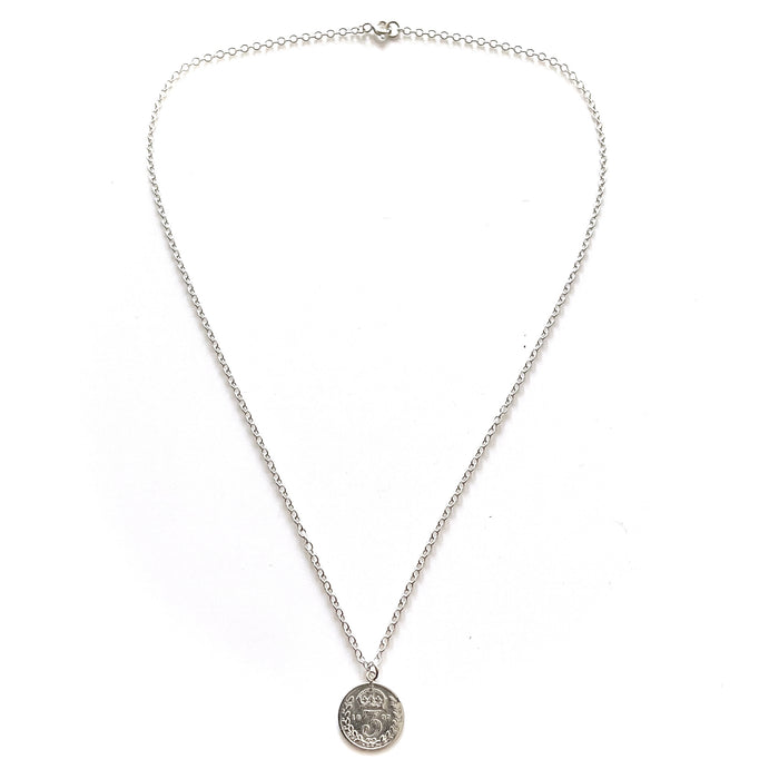 Sophisticated sterling silver necklace featuring a historic 1897 British three pence coin