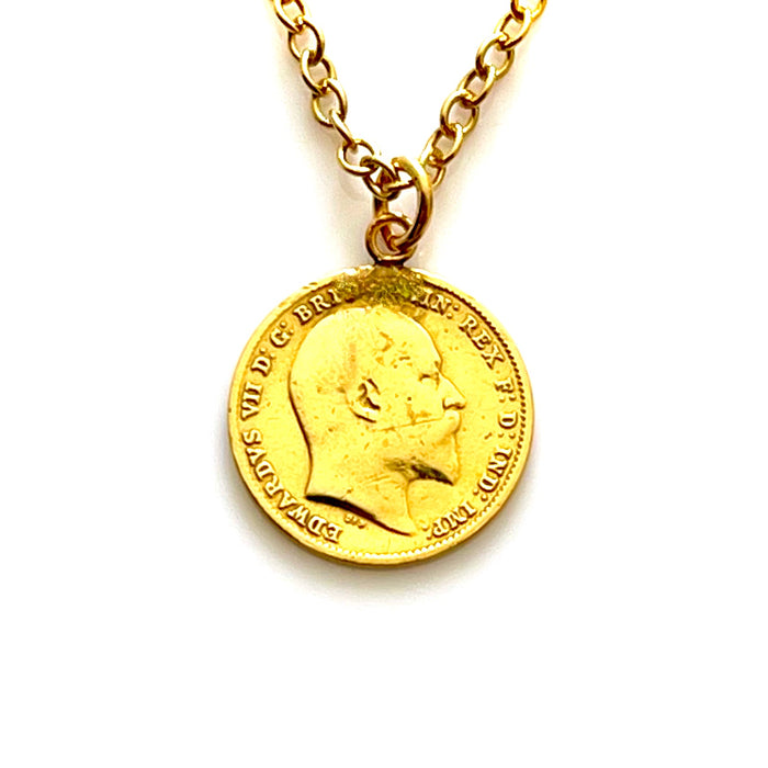 Elegant gold plated 1903 threepence coin pendant close-up