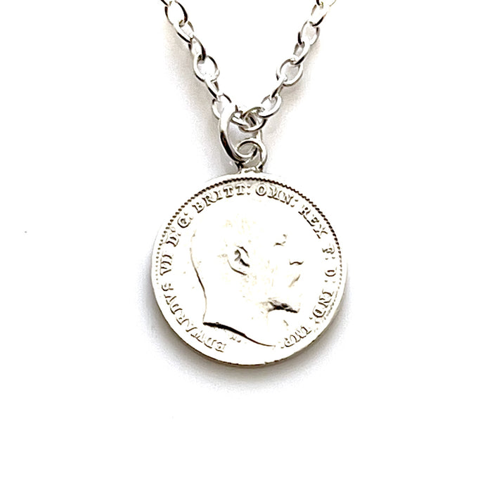 Close-up of 1906 Three Pence Coin Pendant with silver bail