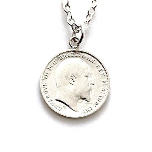 Close-up of 1908 British Silver Three Pence Coin in Necklace Pendant