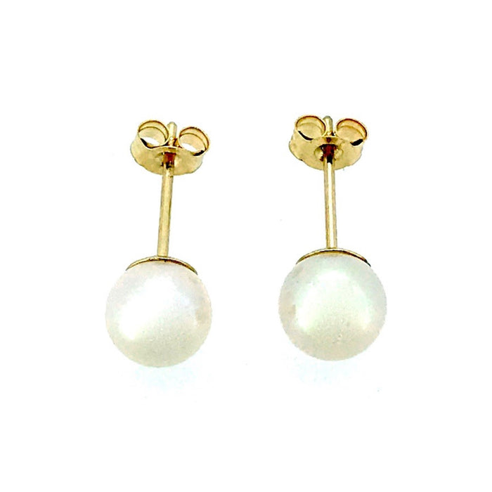 Akoya pearls are set in 9ct yellow gold