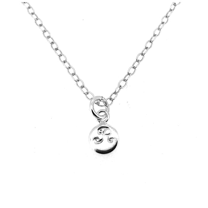 Personalised 6mm sterling silver disc pendant showcasing engraved letter R