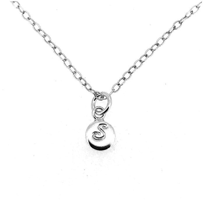 Personalised 6mm sterling silver disc pendant showcasing engraved letter S