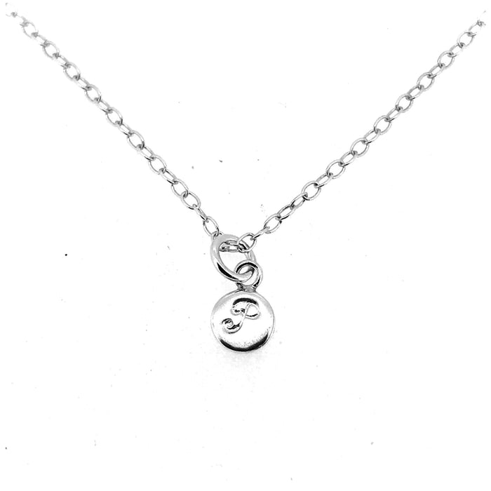 Personalised 6mm sterling silver disc pendant showcasing engraved letter P