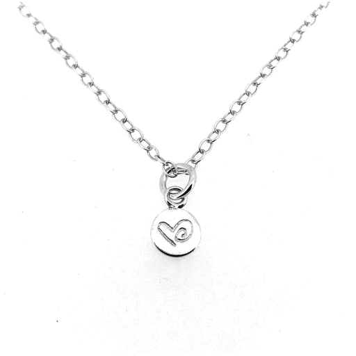 Close-up of Love Heart Necklace pendant with a detailed heart engraving by Roberts & Co