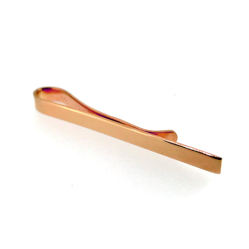 Close-up of 18ct rose gold vermeil tie clip on striped tie