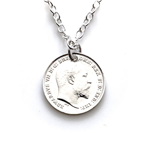 Close-up of 1909 British Threepence Coin in Vintage Enigma Necklace by Roberts & Co